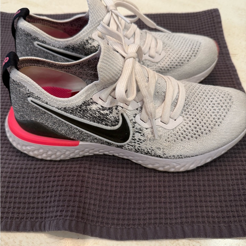 Nike Women's White and Black Sneakers with Pink Accents